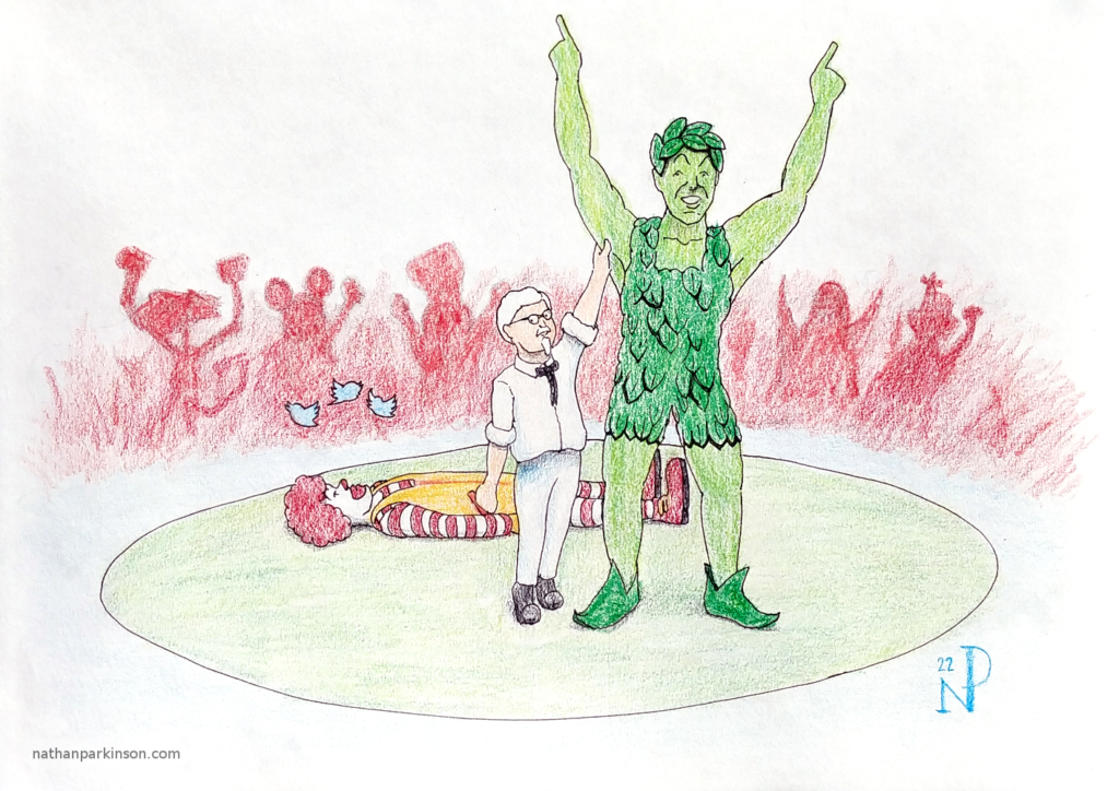 Colonel Sanders holds up Jolly Green Giant's arm as the wresting champion; both of Giant's arms are raised. Ronald McDonald lies unconscious behind Sanders and Giant with Twitter birds circling his head. Red crowd silhouette with some notable characters in background.